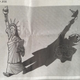 The Statue of Liberty holds a tape recorder and a microphone.